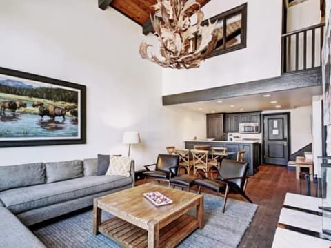Enjoy vaulted ceilings, large windows and an open-concept living room.
