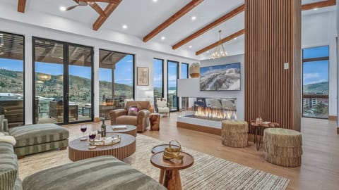 Great Room, Upper Level - With fireplace and views.