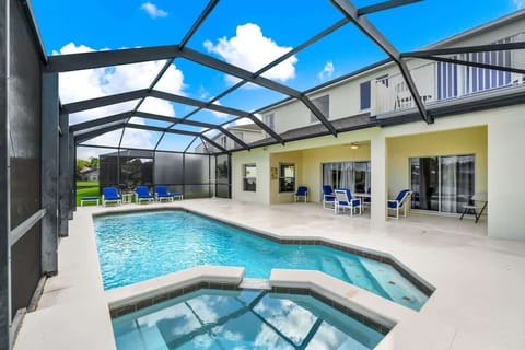 Private screened pool with lounge chairs for soaking up the Florida sunshine.
