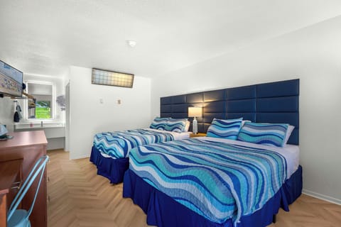 Deluxe Room, 2 Queen Beds, Non Smoking, Refrigerator & Microwave  | Desk, laptop workspace, free WiFi, bed sheets