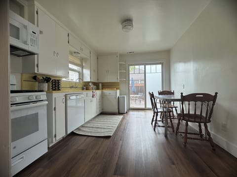 Retro formica table with 4 chairs.