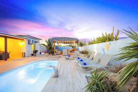 Witness breathtaking sunsets from the comfort of your private pool area. As the sky paints a vibrant canvas, our illuminated pool and serene lounge spaces invite you to unwind and create unforgettable twilight memories.