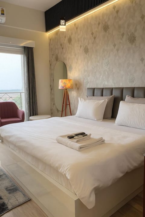 Luxury Room, City View | Desk, laptop workspace, blackout drapes, iron/ironing board
