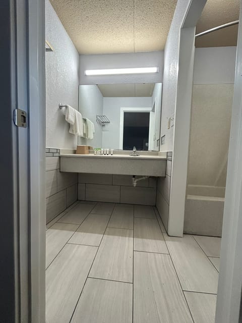 Combined shower/tub, free toiletries, hair dryer, bathrobes