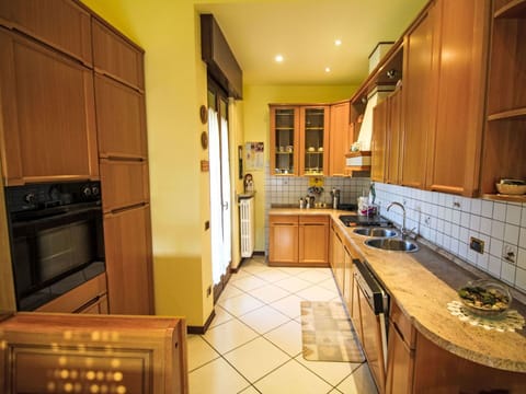 Kitchen, Countertop, Cabinetry, Kitchen Appliance, Interior Design, Flooring, Furniture, Wood, Major Appliance, Floor