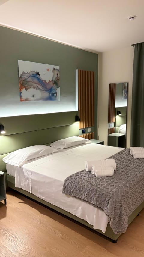 Deluxe Double Room, Balcony, City View | In-room safe, desk, blackout drapes, soundproofing