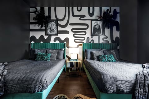 Bathroom 1: Two full beds w/ walk-in closet & 43 in ROKU TV, full length mirror