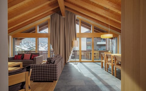 Superior Penthouse, Mountain View | Living area | 40-inch TV with cable channels