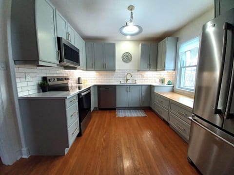 Kitchen; stainless appliances, quartz counter, soft close doors & drawers 