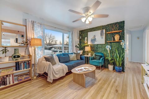 A calming space with floral touches, plush seating, and natural light—ideal for reconnecting after adventures or lounging with your favorite show.