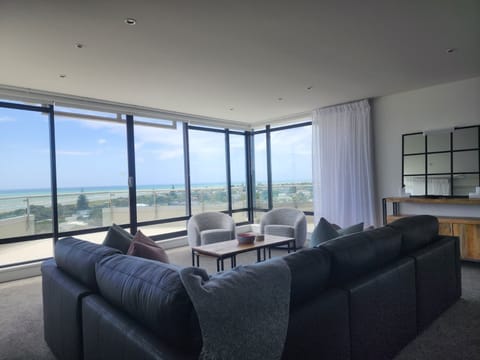 Panoramic Apartment, Ocean View | Living area | Flat-screen TV