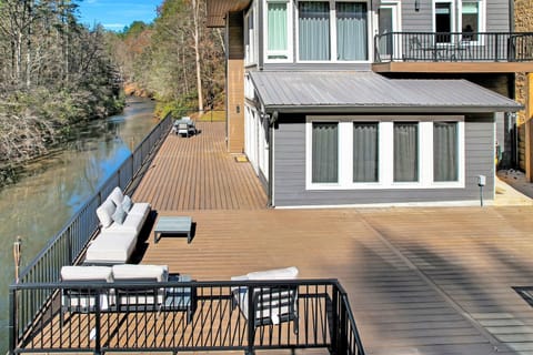 This patio is spacious and has outdoor furniture. Relax and/or play here!