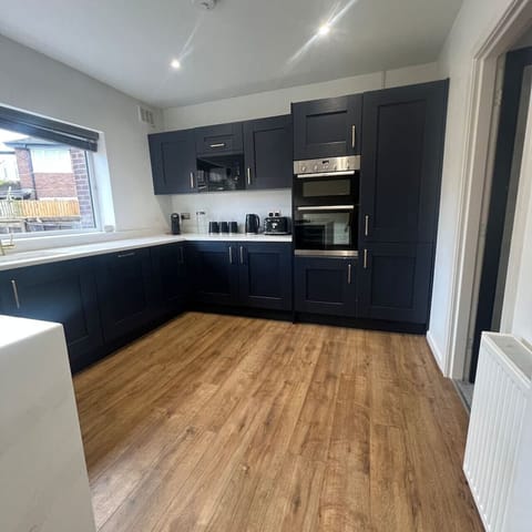 Bright, spacious kitchen with full-size oven