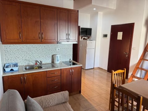 Apartment, Sea View | Private kitchen | Fridge