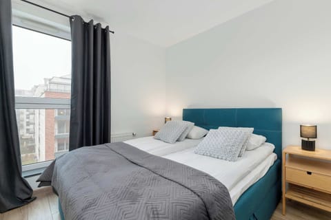 Soft bedding and calm colours create a place where guests can effortlessly recharge after a long day.