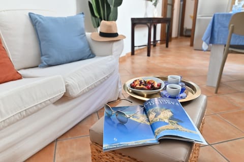 Apartment, City View | Living area | Flat-screen TV