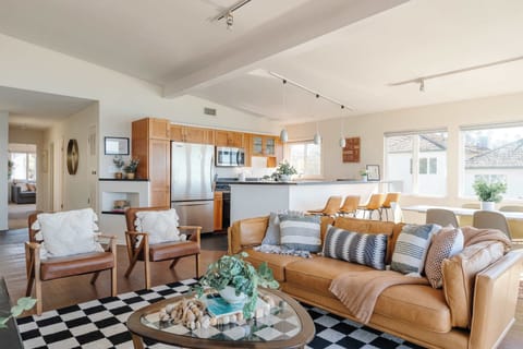 Entertain in style in the chic living room, designed for comfort and brightened by the beauty of the ocean outside.