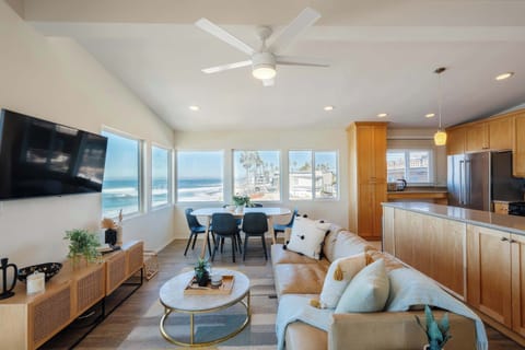 The living room is designed for comfort and connection, ideal for spending quality time with loved ones.