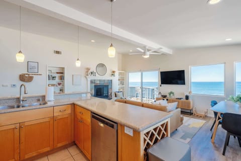 Cook your favorite meals in a functional kitchen, where the layout is perfect for both cooking and casual dining.