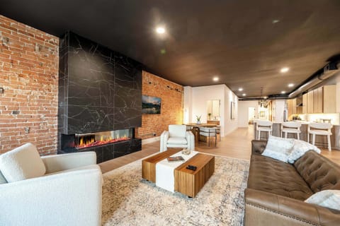 Open-concept living with rich textures and room to relax with ease.