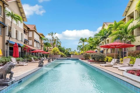 The shared lap pool offers an ideal place for morning swims or leisurely afternoons stretched out on a sun lounger beneath the tropical sky.