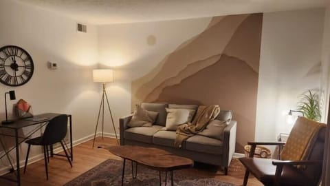 Living Room: Welcome to the living room, a space to hang out with your loved ones.