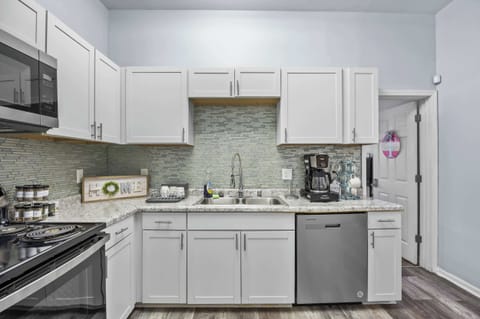 Kitchen: Full-size appliances & ample counter space for long-term comfort. Cook all your meals easily! Functionality is key for extended stays.