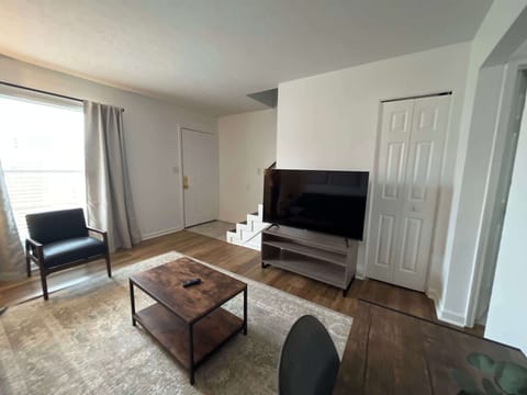 Living Room: Gather your loved ones and have a great time watching your favorite movies on this large smart TV.