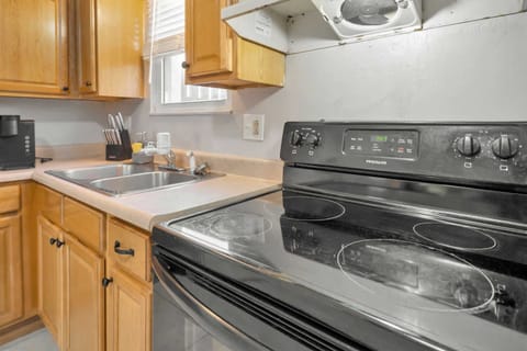 Kitchen: A bright and functional kitchen ready for your home-cooked meals! 