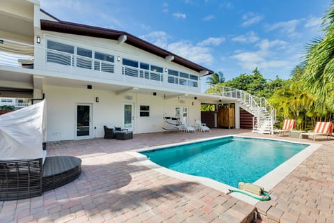 Relax in this tropical getaway in your private pool, mins to the beach