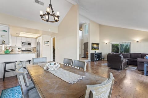 Open-concept living and dining area designed for comfort, connection, and easy entertaining.