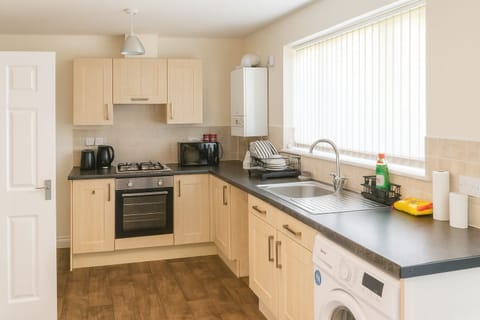 Spacious kitchen and dining area for relaxed meals and morning coffee.