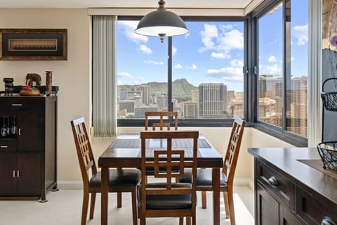 Morning light, mountain backdrop, city buzz. Your coffee tastes better here. Honolulu living at its finest.