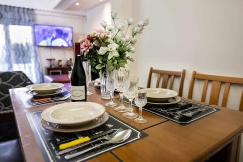 Classic Apartment, 3 Bedrooms, Courtyard View | Living area | 5-inch TV with satellite channels