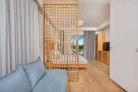 Junior Studio Suite, Garden View | In-room safe, soundproofing, iron/ironing board, free WiFi