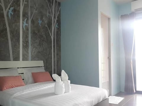 Desk, blackout drapes, rollaway beds (surcharge), WiFi (free)