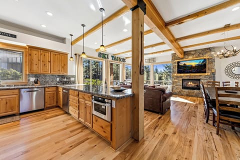 Open kitchen and living area designed for cooking, gathering, and unwinding together