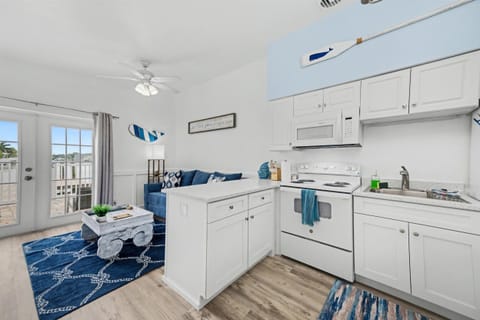 Fully Equipped Coastal Kitchen with Modern Appliances