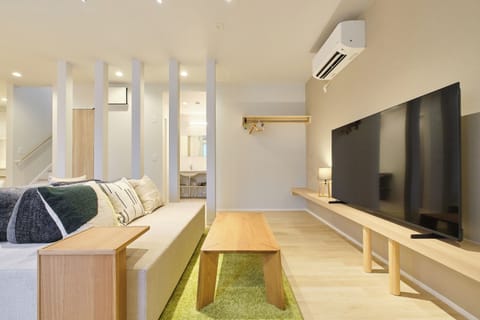 Comfort Condo, Non Smoking | Living area | 65-inch flat-screen TV with digital channels