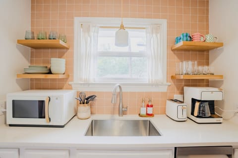 Fully Stocked Kitchen With Coffee and Kurig Pot