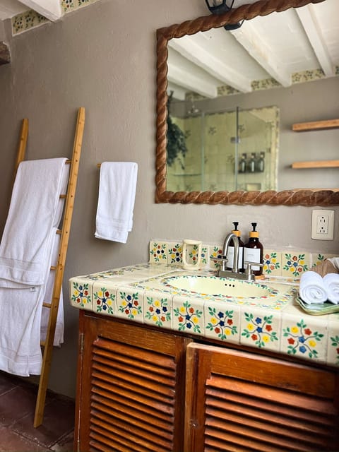 Superior Quadruple Room | Bathroom | Shower, hair dryer, towels, soap