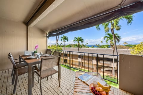 Dine alfresco on the balcony with tropical fruit, island breezes, and sunny skies