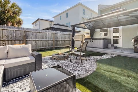 Private backyard with fire pit, hot tub & grill area 
