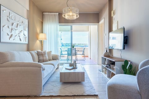 Apartment, 3 Bedrooms, City View, Poolside | Living room | 43-inch Smart TV with digital channels, Netflix, streaming services