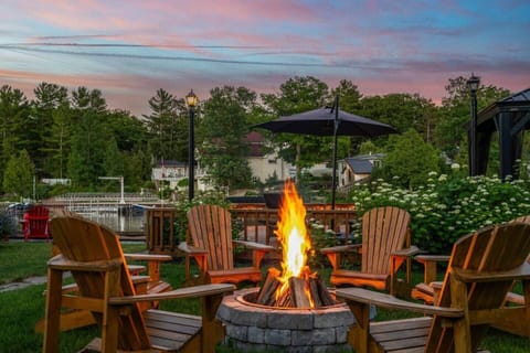 Gather friends around a cozy firepit with a mesmerizing river view. Enjoy the warmth of the flames, the soothing sounds of the flowing water, and the company of good friends.