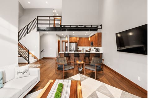 Modern Open-Concept Kitchen with Bar Seating for 4 (second floor)