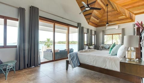 Deluxe Bungalow, 1 King Bed, Beach View | In-room safe, individually decorated, individually furnished