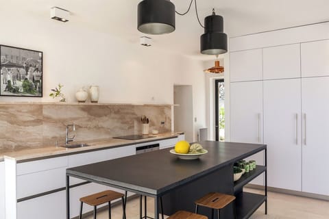 The well-equipped kitchen has plenty of space for cooking up a feast.