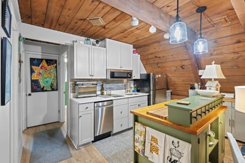 Well-equipped mini kitchen ideal for preparing simple meals with ease.