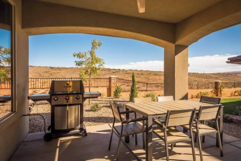 Private patio with BBQ grill and outdoor dining